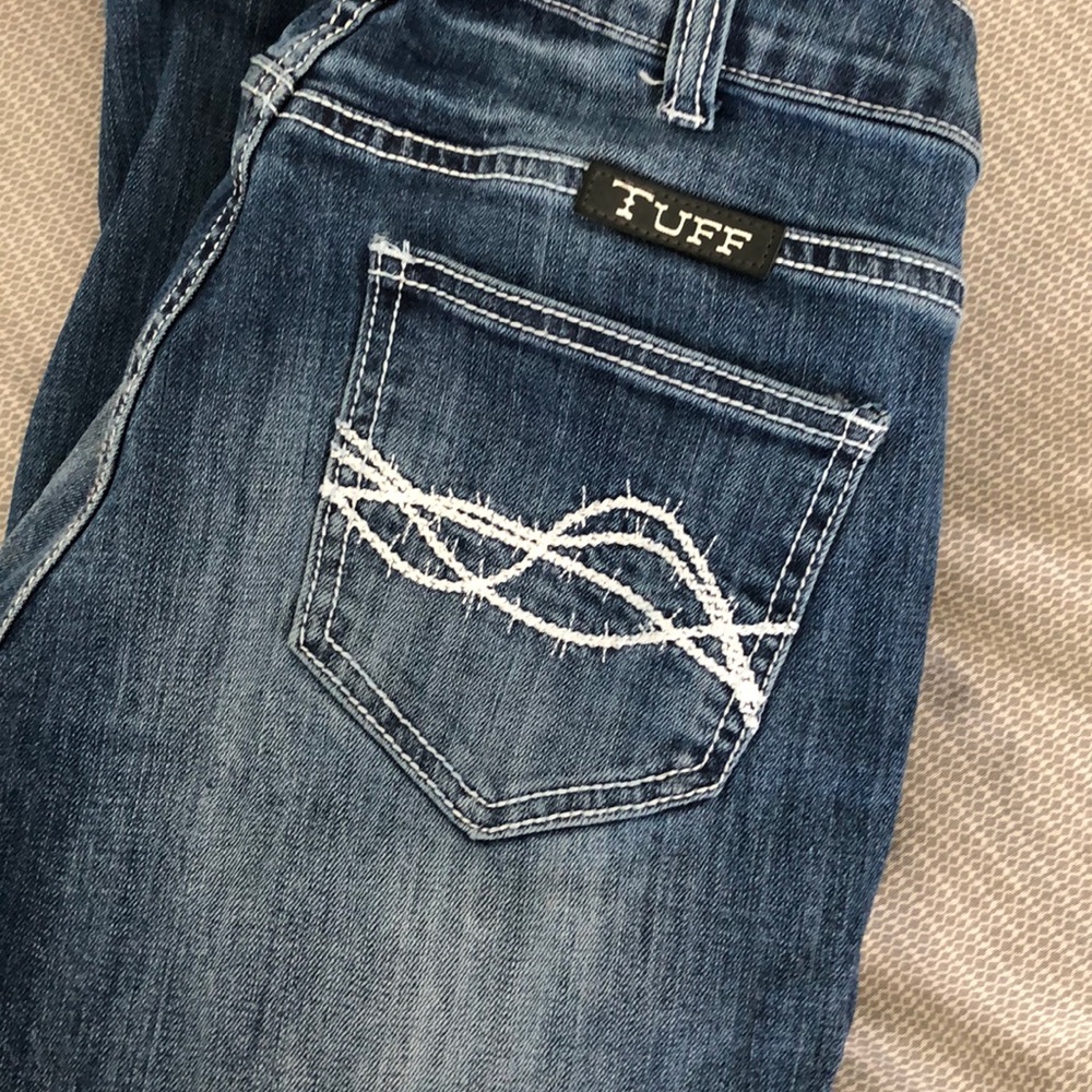 Brand new never worn Cowgirl Tuff jeans.